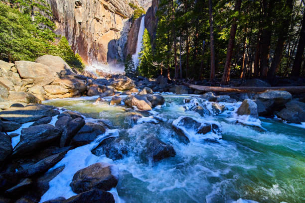 istock Early spring at Yosemite with slushy rivers and rainbow by Yosemite Lower Falls 1490382143