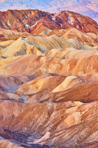 Image of Endless ripples of color cover desert mountains at Zabriskie Point