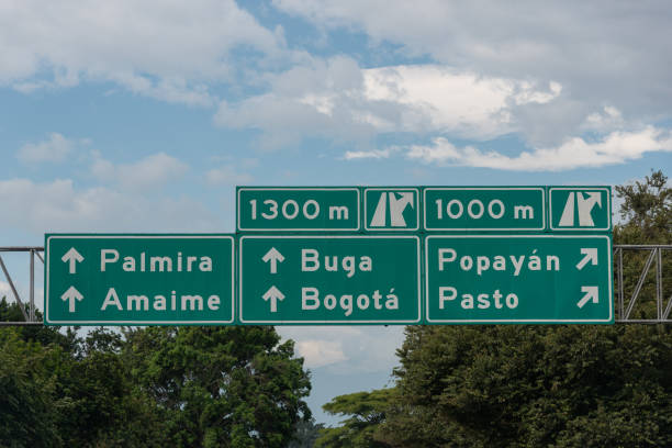 Road signage in Valle del Cauca. Colombia. Road sign with several addresses of cities and municipalities in Colombia palmira colombia stock pictures, royalty-free photos & images