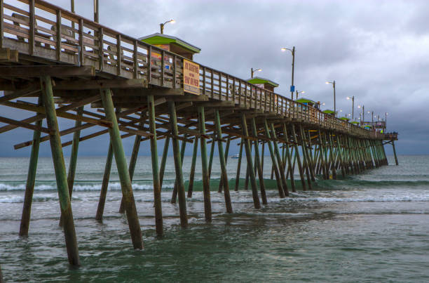 istock Large fishing pier extending out into the ocean 1490384951