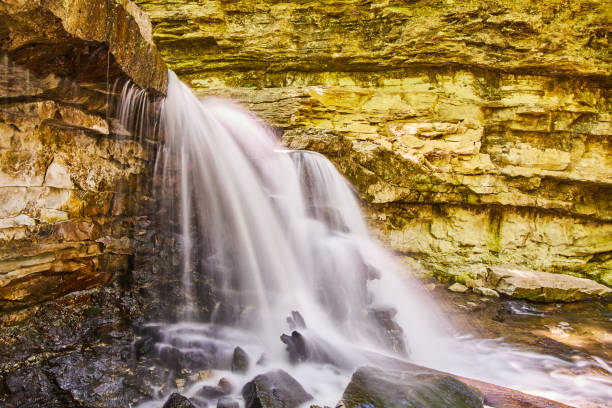 istock Full view up close of waterfall in canyon 1490385126