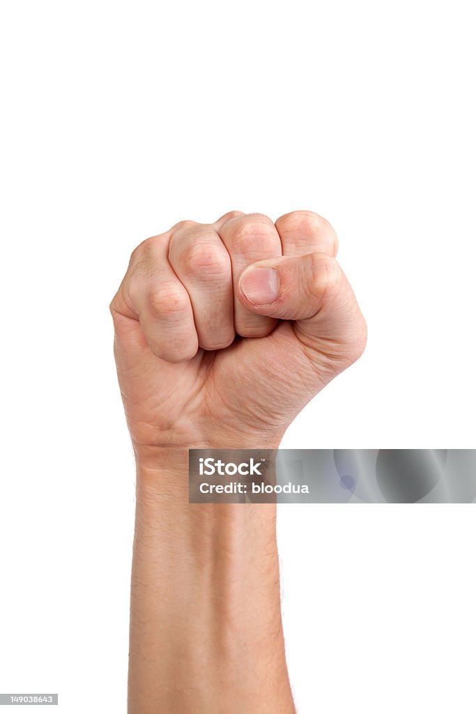 Males hand with a clenched fist isolated Hand with clenched a fist, isolated on a white background Fist Stock Photo