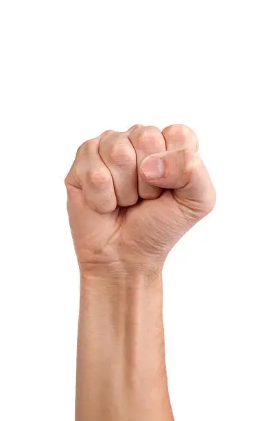 Photo of Males hand with a clenched fist isolated