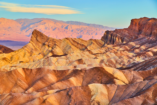 Image of Iconic sunrise sediment waves of colors in Death Valley Zabriskie Point