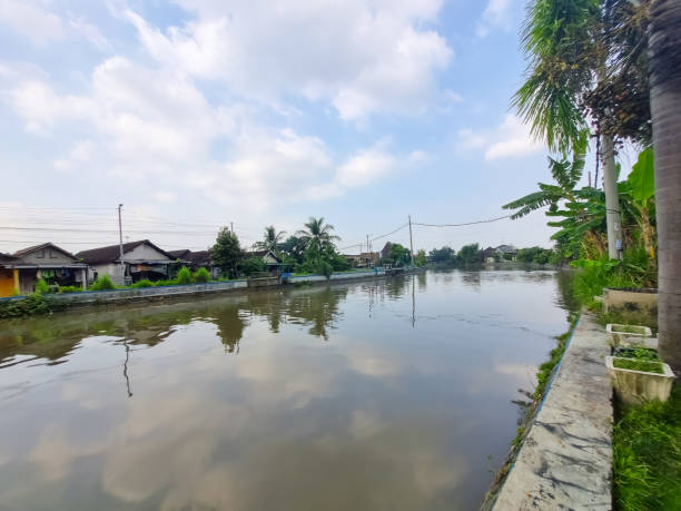 istock a river in the middle of a village 1490391138