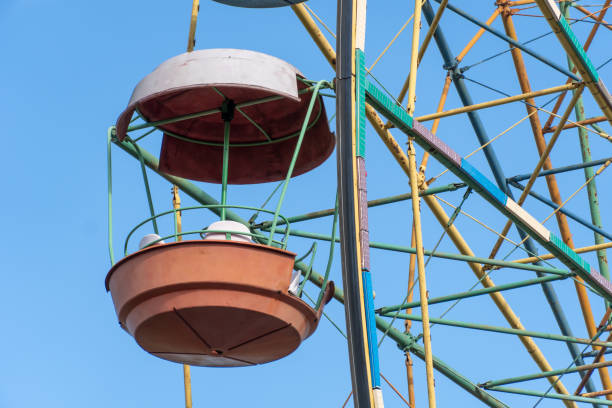 istock Old colorful ferris wheel in amusement park. 1490393711