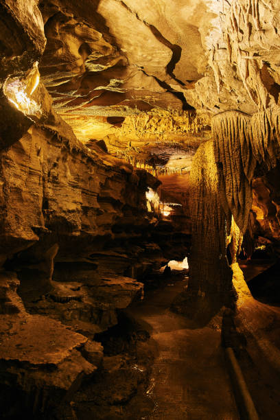 istock Large cave path with rock formations underground midwest america stalagmites and stalactites 1490394058