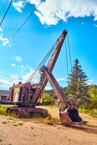 istock Large mining equipment against bold blue sky 1490394226