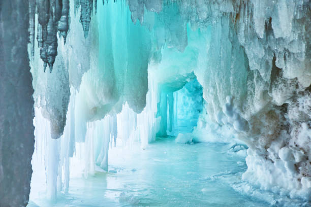 istock Narrow blue cave of ice in winter 1490399944