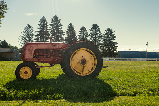 Fort Meade, FL - February 22, 2022: Low perspective front corner view of a 1957 Case 400 High Crop Tractor at a local tractor show.