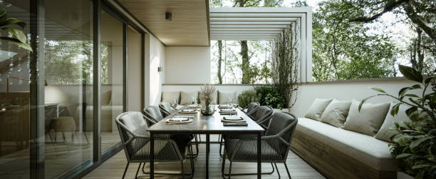 istock Modern home terrace. Luxury outdoor dining table with chairs. Interior design. 1490401060