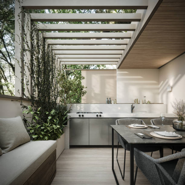 istock Modern home terrace. Luxury outdoor table with chairs and built in barbeque. Interior design. 1490401078
