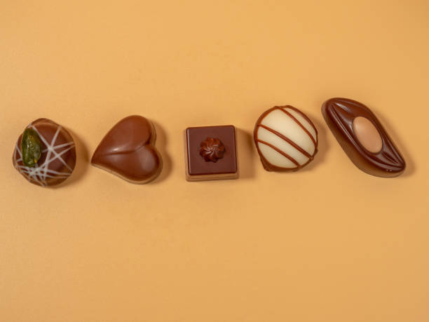 istock Assorted gourmet pralines in white, dark and milk chocolate. 1490402105