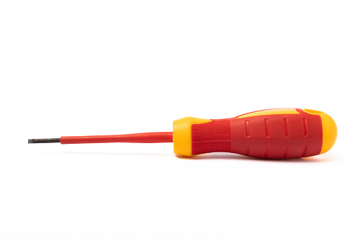 Red screwdriver isolated on white background. Tool.