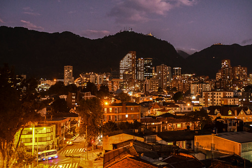 Vibrant cityscape at night in Bogota, Colombia.\
