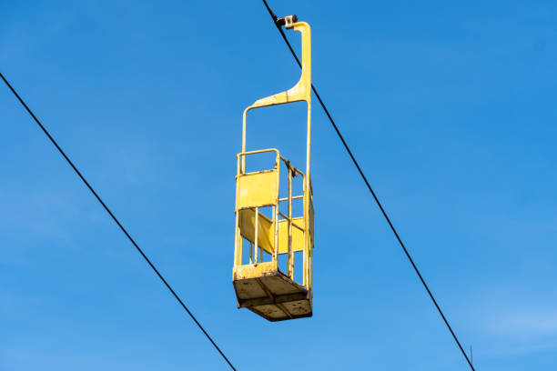 istock Abandoned cabin cableway for transporting people in amusement park. 1490405374