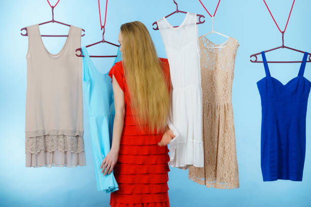 istock Woman choosing clothes in shop 1490407382