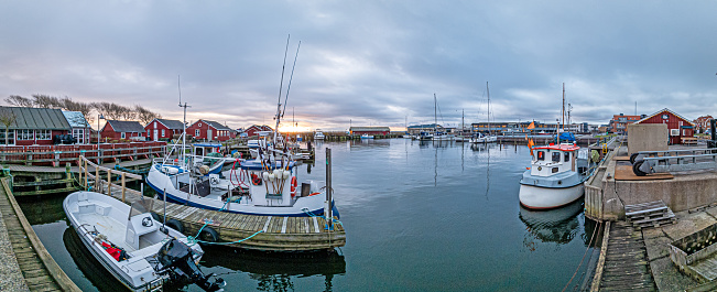 Panoramic view over the harbor of the historic municipality of Ringkobing in Jutland in the evening
