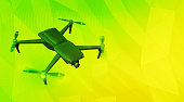 A small quadcopter drone on a vibrant yellow background with copy space