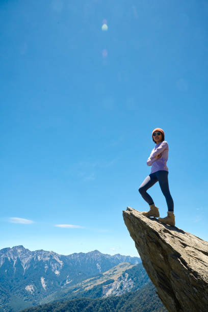 istock Hiker on the top of the mountain peak. 1490414343