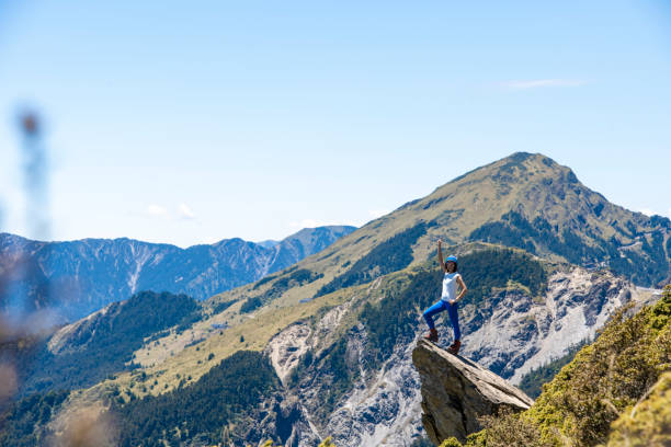 istock Hiker on the top of the mountain peak. 1490414546