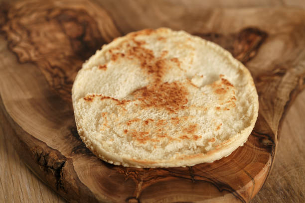 istock burger bun on the wooden board 1490426315