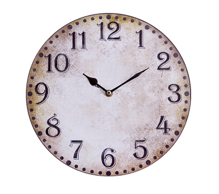 Old clock with black arrows isolated on a white background.