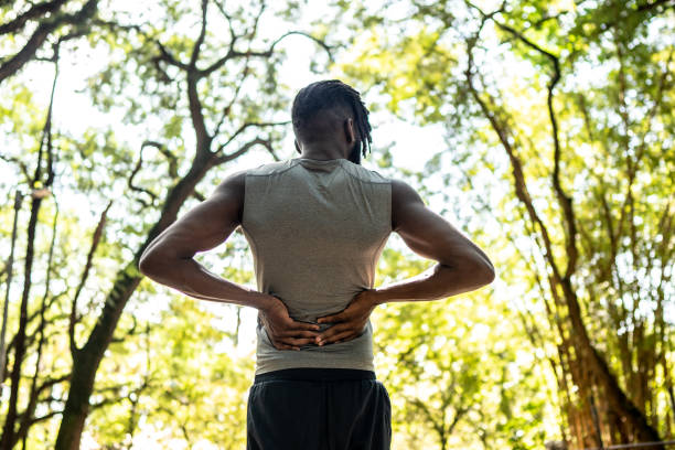 istock Young man stretching in the park 1490431762