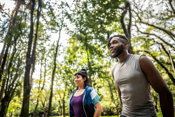 istock Friends walking in the park 1490433802