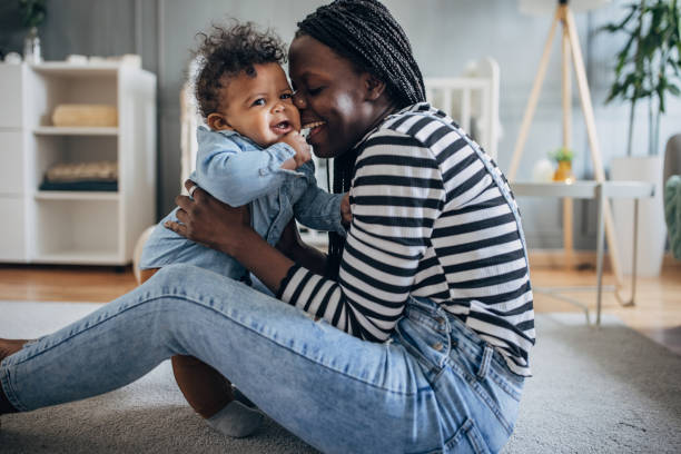 istock Mother playing with her baby boy 1490434739