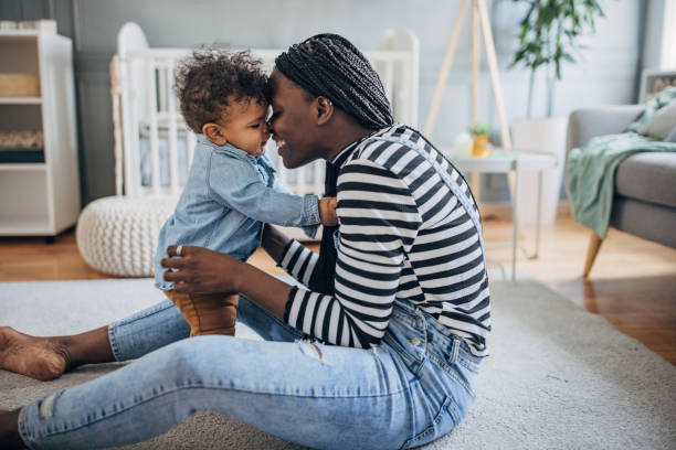 istock Mother playing with her baby 1490434746