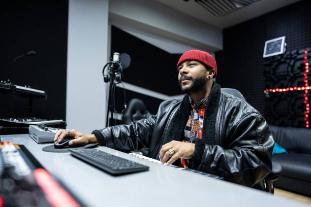 istock Producer man using a sound mixer in the recording studio 1490436464
