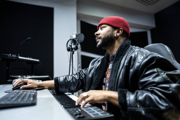 istock Producer man using a sound mixer in the recording studio 1490436485