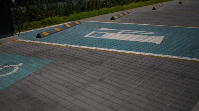 Parking space for electric cars