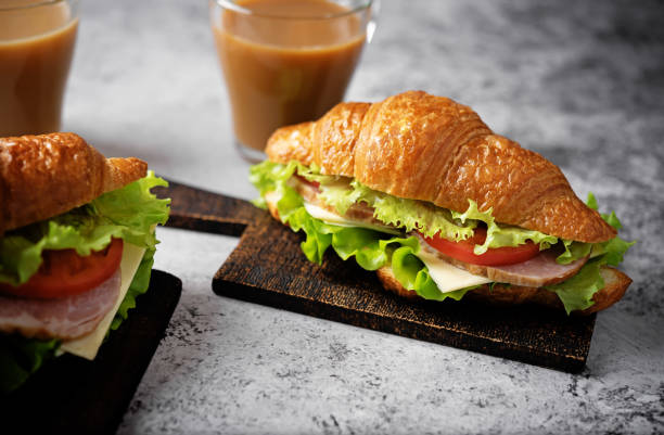 istock Meat cheese tomato croissant for breakfast 1490439265