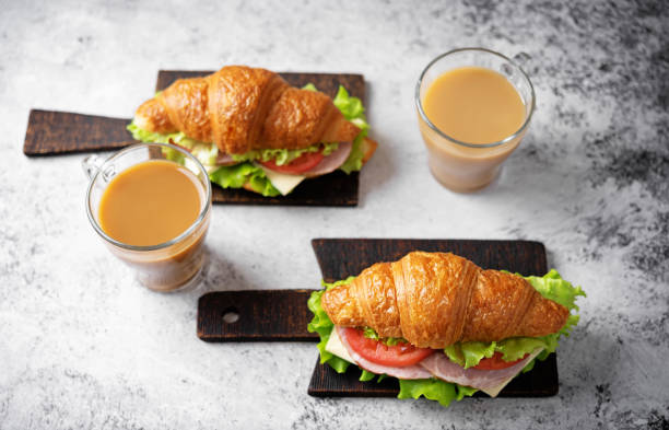istock Meat cheese tomato croissant for breakfast 1490439290