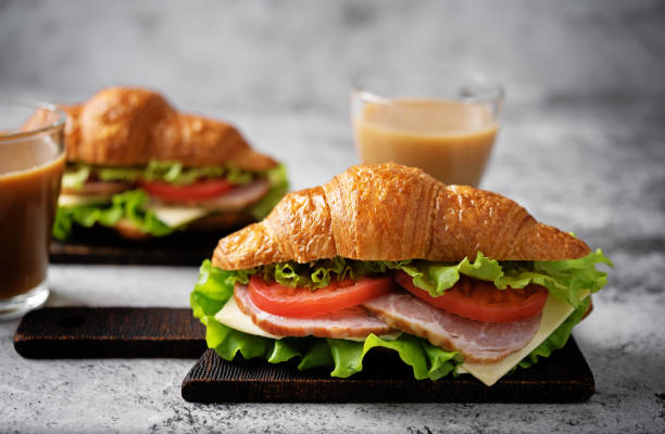 istock Meat cheese tomato croissant for breakfast 1490439291