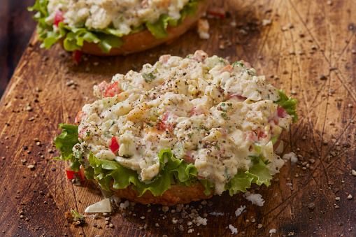 Creamy Open Faced Egg Salad Sandwich on a Toasted Cheese Bagel