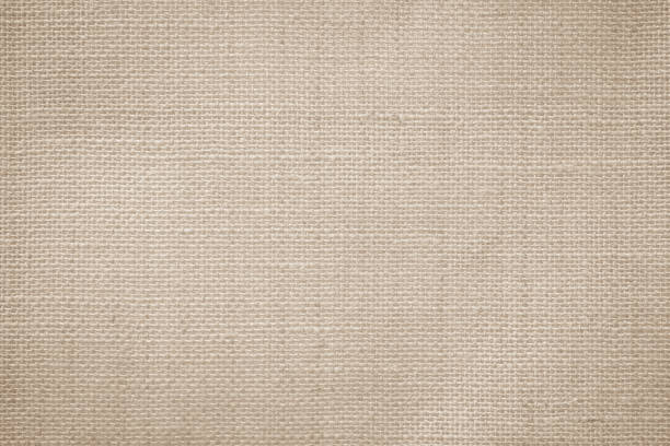 istock Detailed woven fabric texture background mesh pattern light beige color blank. Jute hessian sackcloth burlap canvas Natural weaving fiber linen and cotton cloth texture as clean empty for decoration. 1490441983