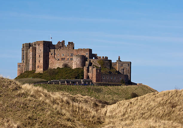 istock Grass and Dunes at Bamburgh Castle 149044395