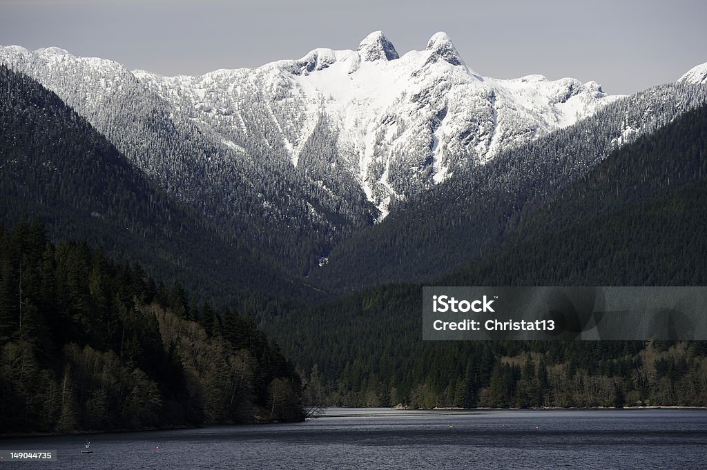 Snowy Mountains Snow covered Mountains and lake in Vancouver, BC British Columbia Stock Photo