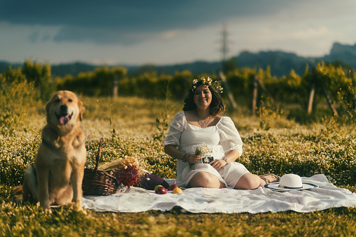Girl coming to a surprise picnic with fruits.