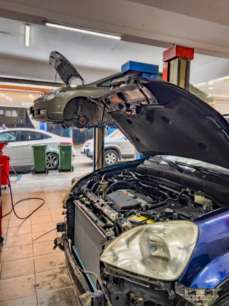 istock Car engine at repair shop 1490449750