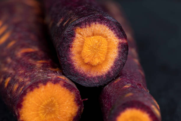 Sliced purple-orange carrots on the table