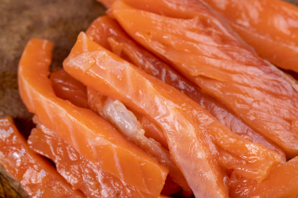 istock Sliced red trout meat with sea salt 1490450614