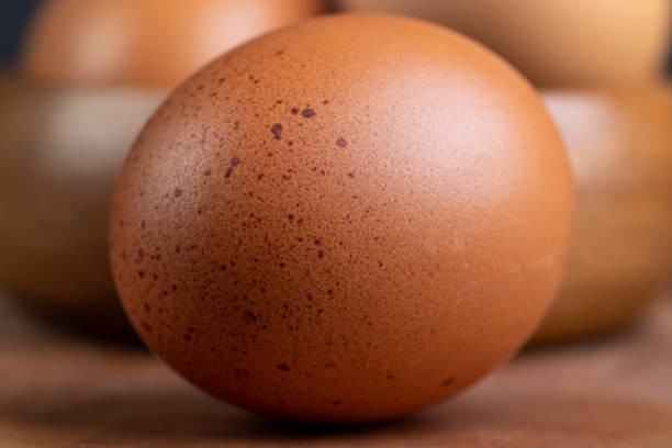 istock A whole orange chicken egg close-up on the table 1490450686