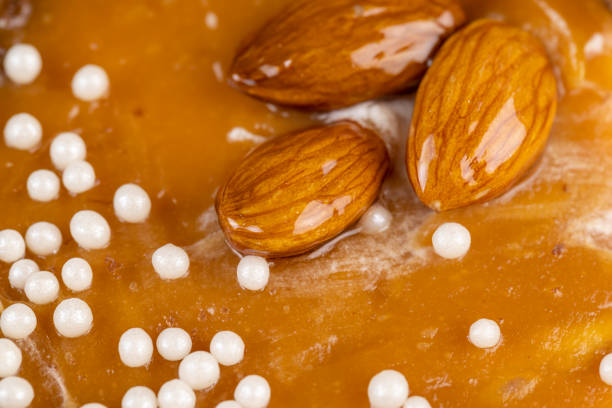 Crispy cake with salted caramel and nuts, delicious sweet dessert made of dough with caramel and nuts