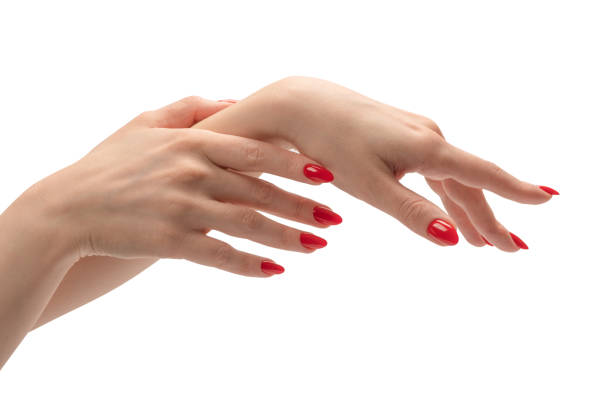 istock Woman hands with red nails isolated on a white background. 1490451833