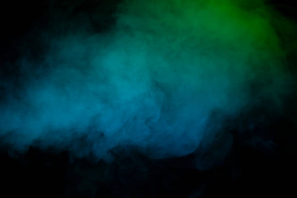 istock Blue and green steam on a black background. 1490451869