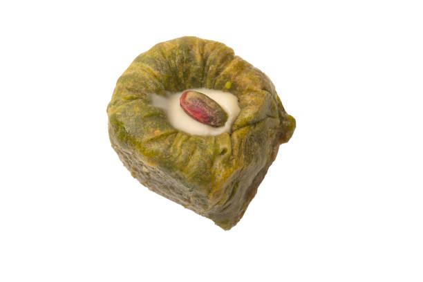 istock Turkish pistachio baklava isolated on white background. 1490451935